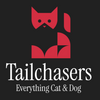 Logo of Tailchasers with red cat and dog shapes on a black background